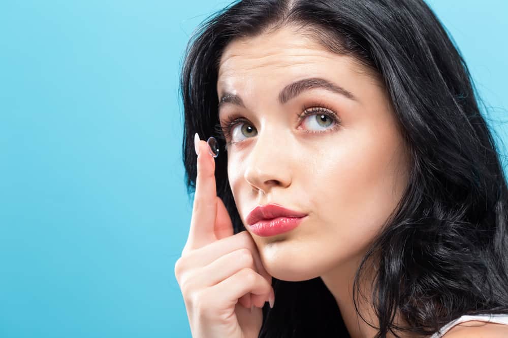 Beautiful Young Woman With Contact Lens