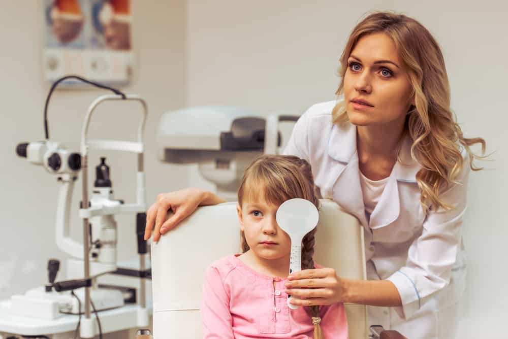 Little Girl At The Ophthalmologist On Consultation