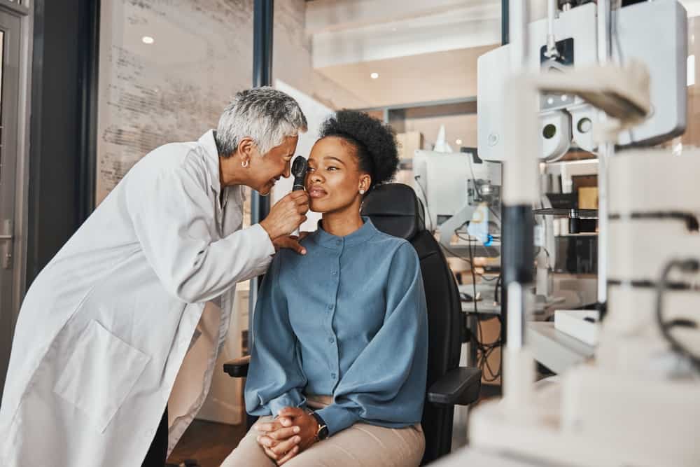 woman and ophthalmologist