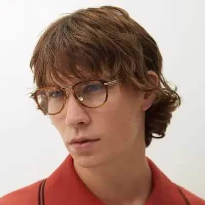 man-wearing-brown-rimmed-dita-eyewear